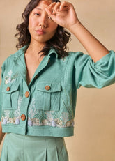 A Model Wearing Green Organic Cotton Ocean Oasis handwoven jacket, curated by Only Ethikal